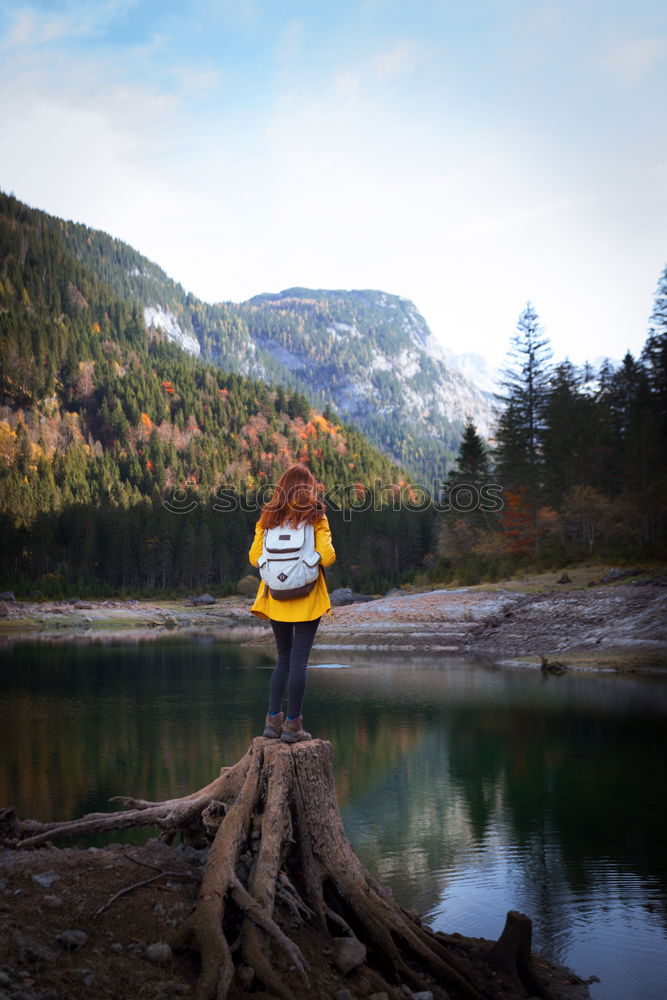 Similar – Women at lake in mountains