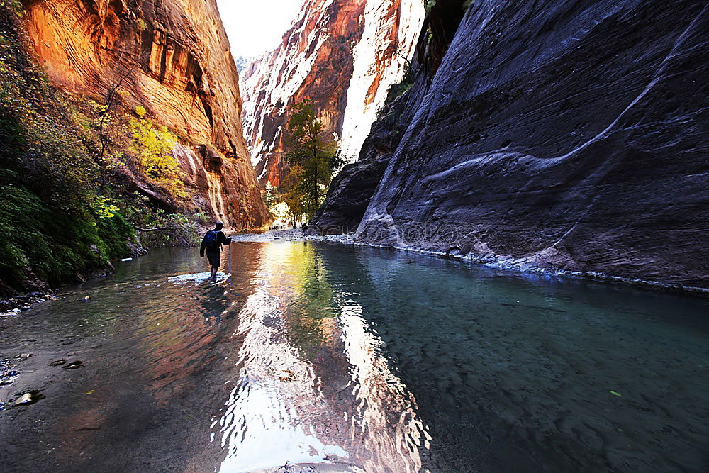 Similar – Image, Stock Photo All year round water bearing billabongs overhanging several red rocks. Framed by bushes. The tourist destination in the Red Centre- Garden of Eden.Kings Canyon. Outback Northern Territory. Australia.