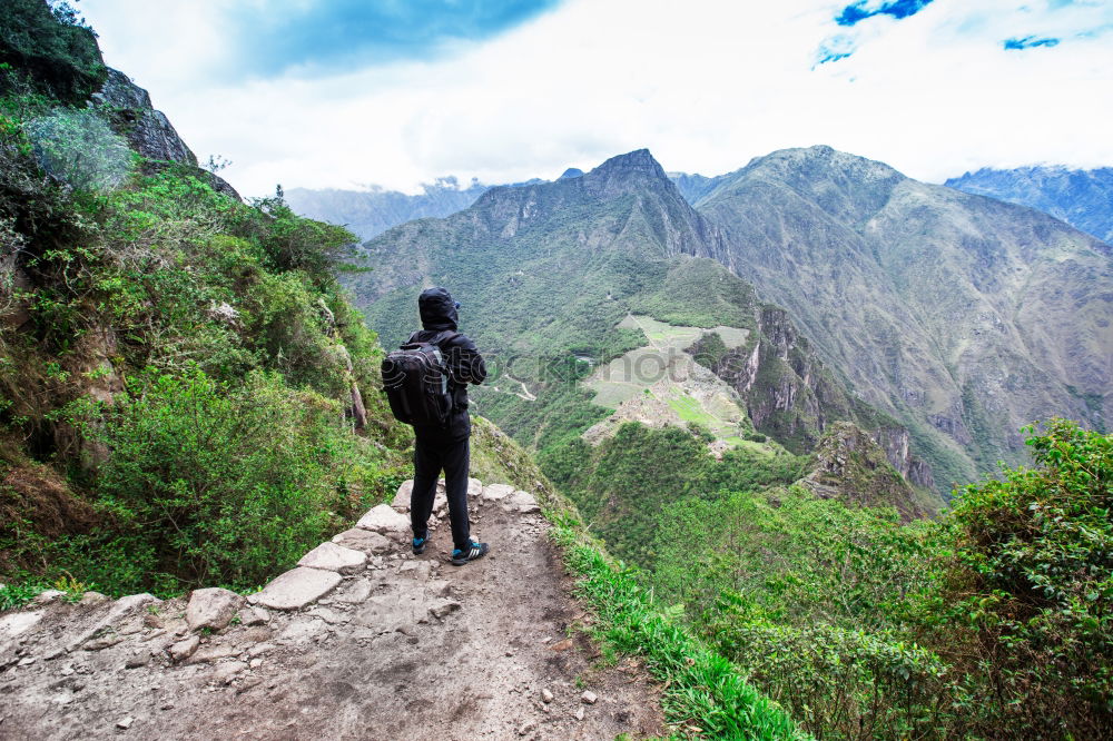 Similar – Image, Stock Photo Standing couple holding hands contemplating the terraces over Machu Picchu, the most visited tourist destination in Peru. Rear view image.