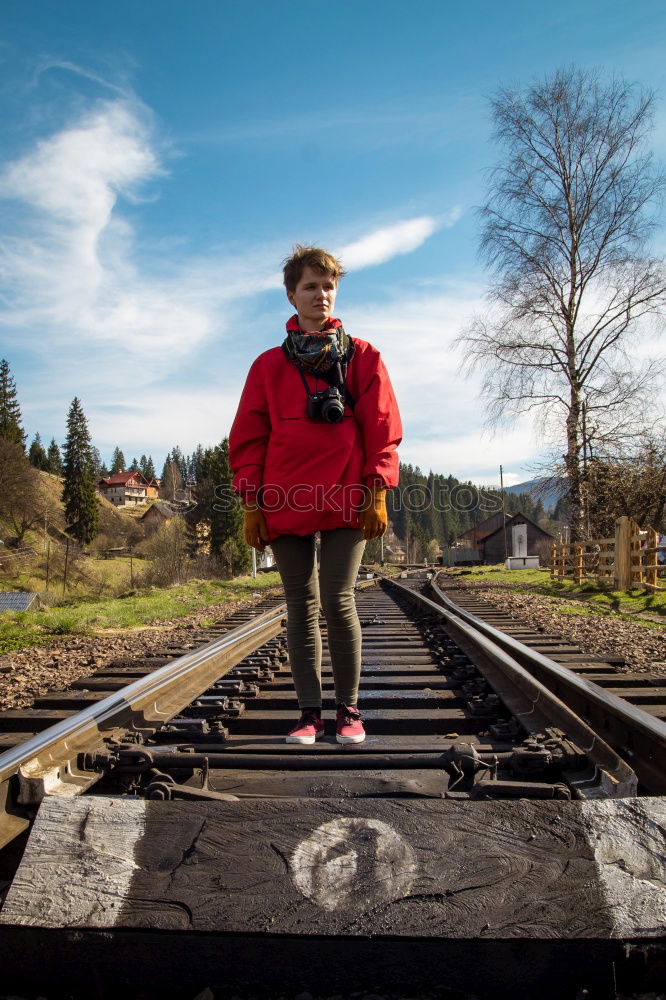 Similar – Man running on railroad