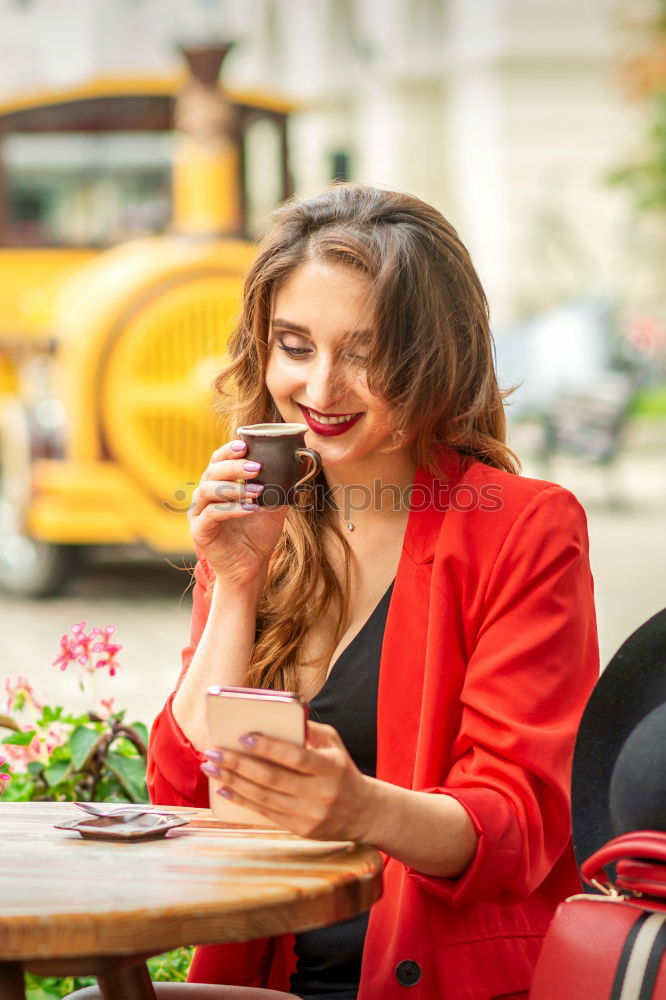 Similar – Image, Stock Photo Girl sitting in a street bar looking at her smartphone