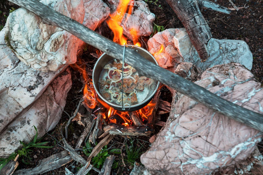 Similar – Making coffee on campfire