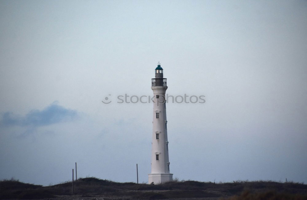 Similar – Foto Bild Leuchtturm vor Meer bei bewölktem himmel.