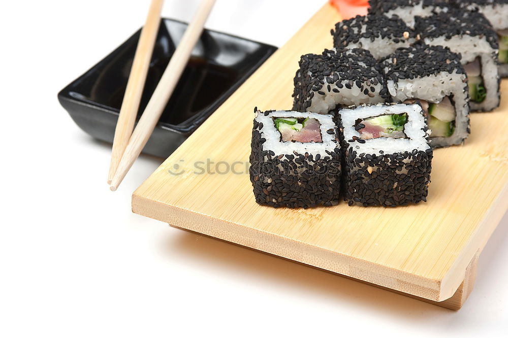 Similar – Sushi maki rolls on a tray