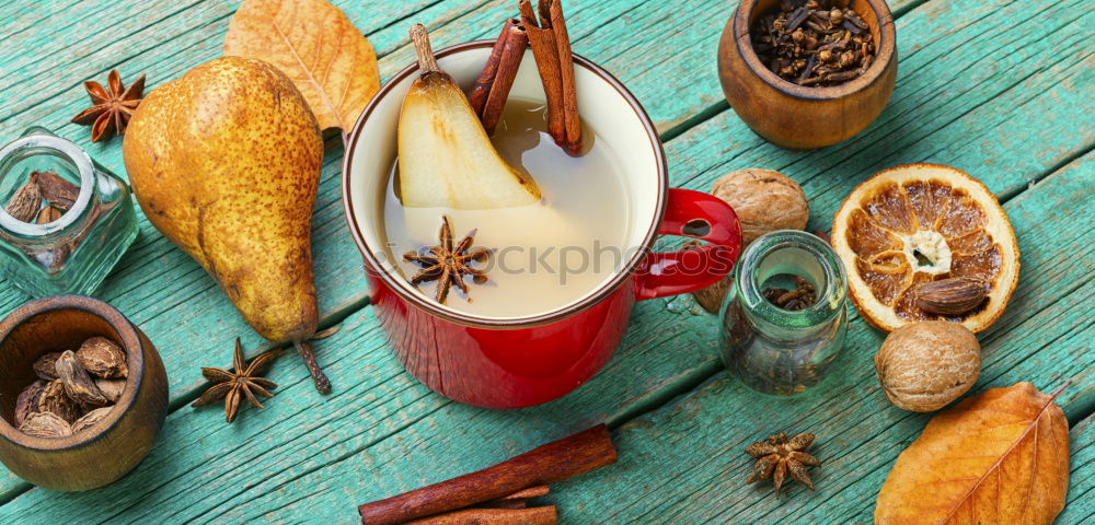 Similar – Tea brunch with coloured teacups, teapot and cake