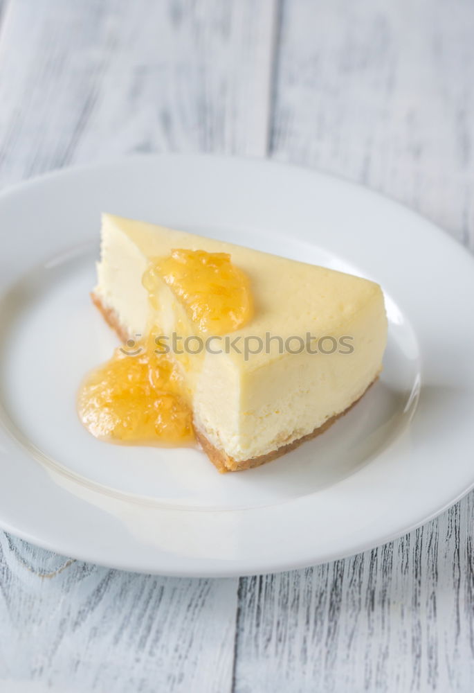 Similar – Cheese cake on white wood with cake tip