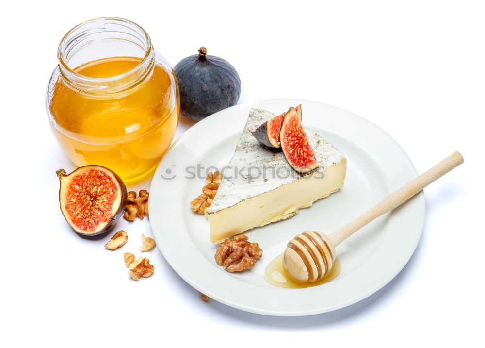 Similar – Image, Stock Photo Cheese sorts with fig mustard sauce and spoon