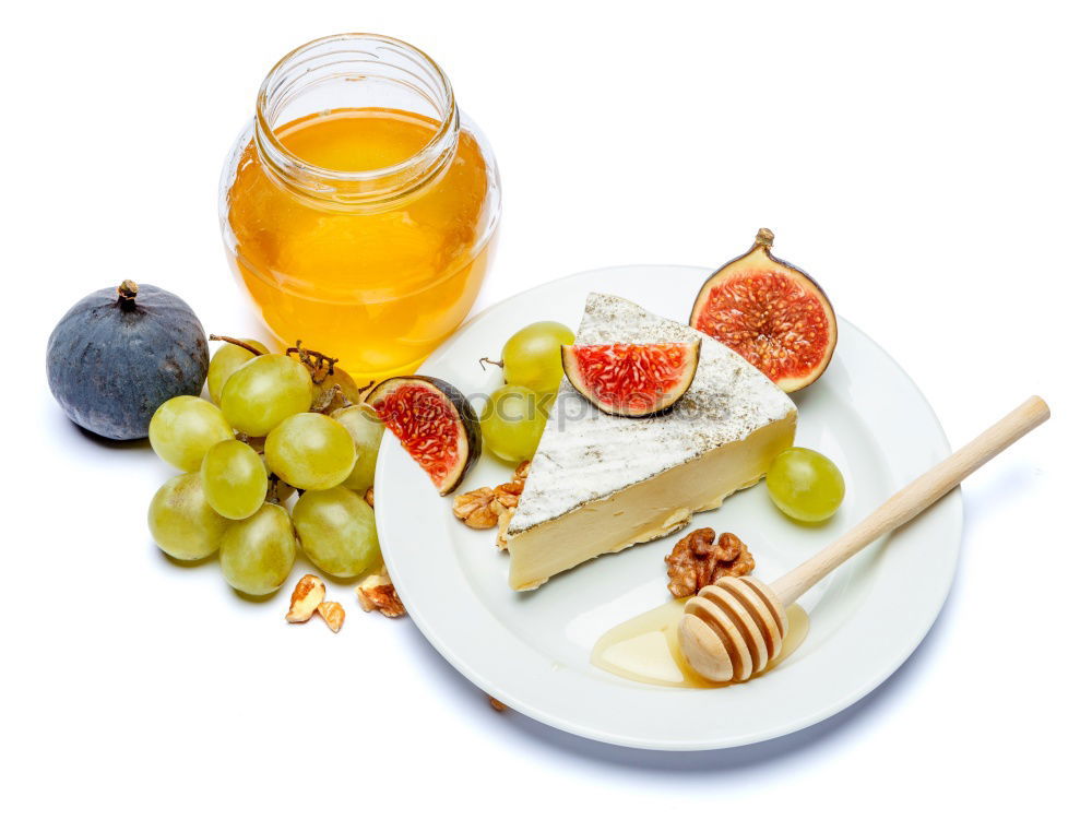 Similar – Image, Stock Photo Cheese sorts with fig mustard sauce and spoon