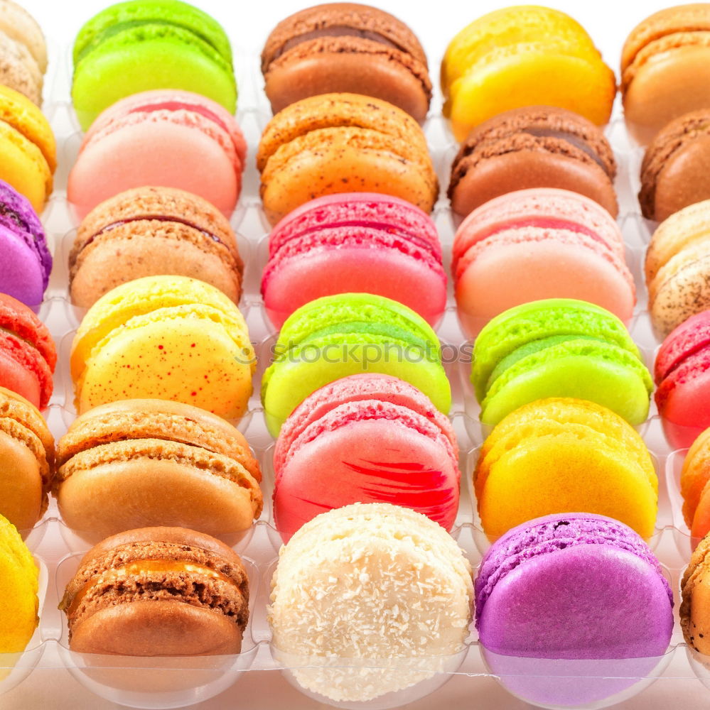 Similar – Multicolored macarons in a paper box