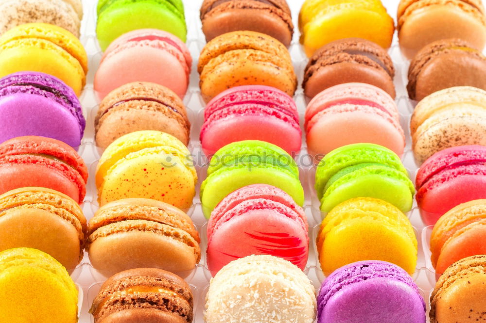 Similar – Multicolored macarons in a paper box