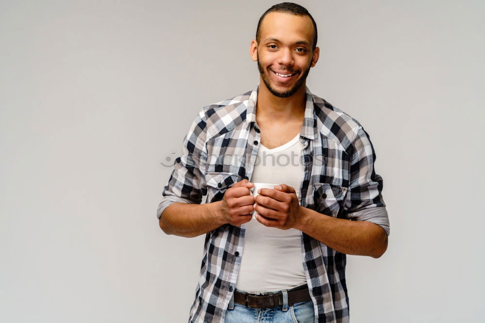 Similar – Image, Stock Photo Young black man wearing casual clothes walking smiling down the street