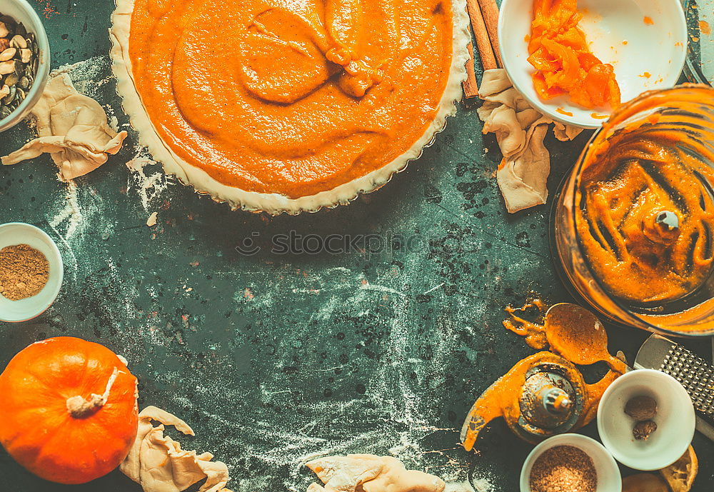 Similar – Image, Stock Photo Pumpkin cake preparation with ingredients and kitchen utensils