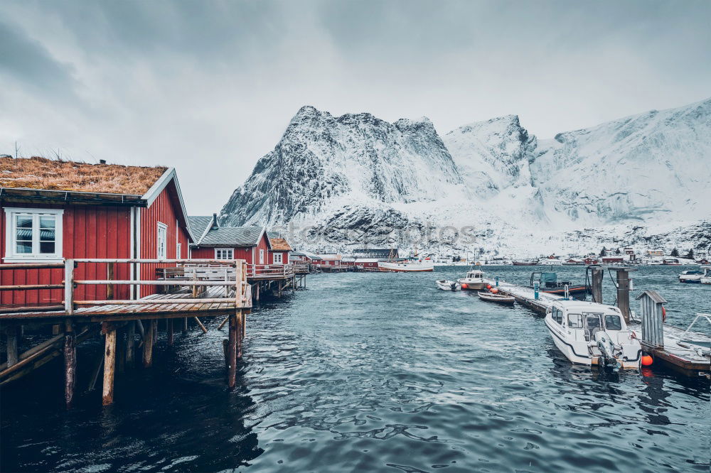 Similar – Small houses on lakeside in mountains