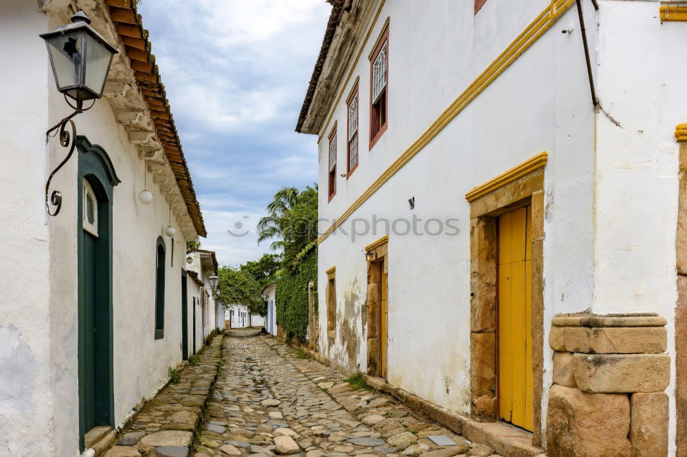 Similar – Beco de tampas de bueiros