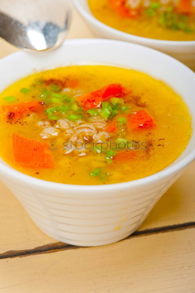 Similar – Fresh pumpkin soup in three bowls on a wooden table