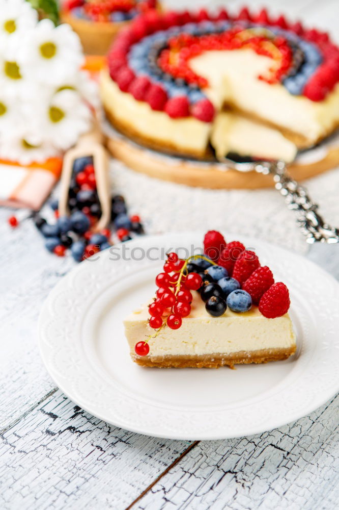 Similar – Delicious tartlets with raspberries and blueberries