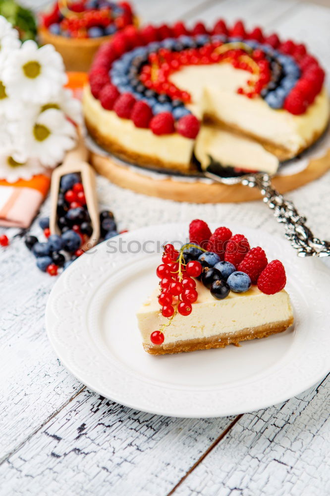 Similar – Delicious tartlets with raspberries and blueberries