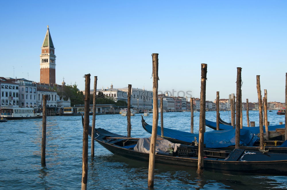 Similar – Image, Stock Photo Empty gondolas floating on a lagoon of Venice, Italy