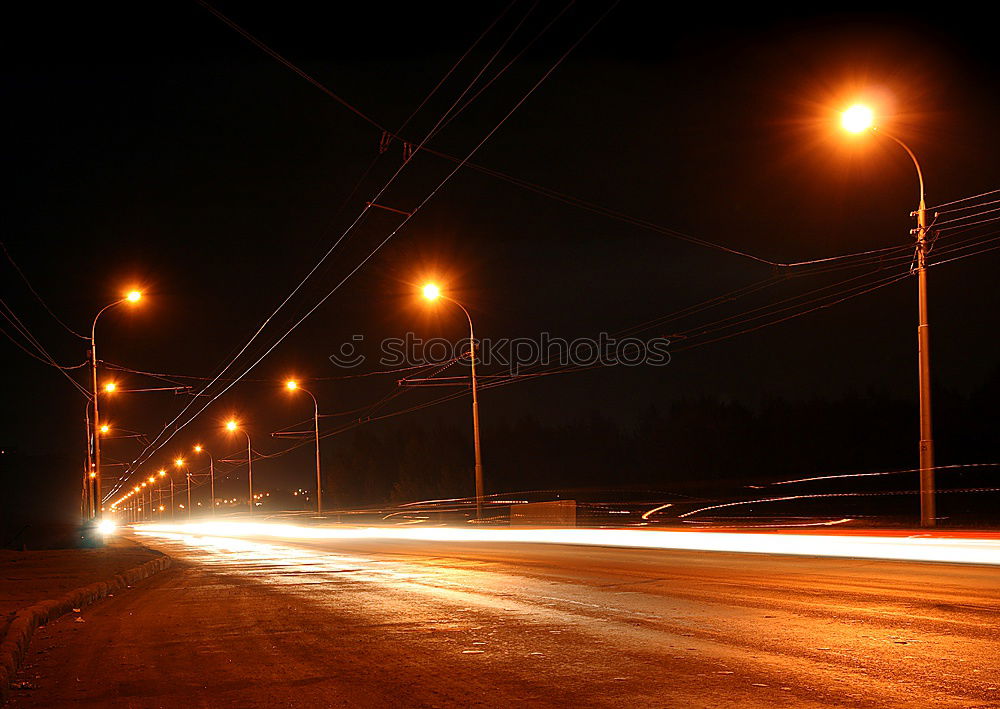 Similar – snowy road at night Night