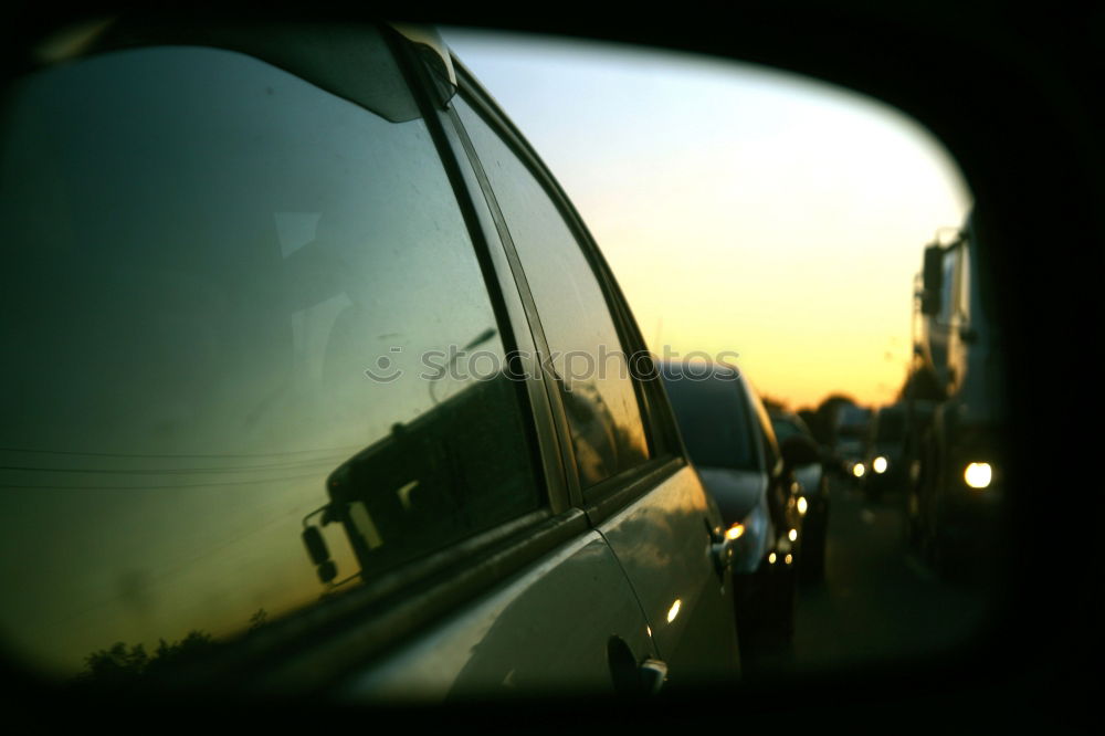 Similar – Sunset Rear view mirror