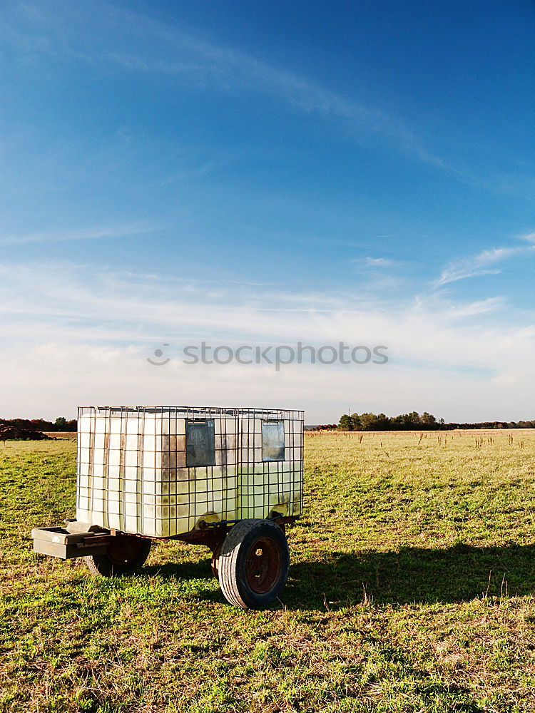 Similar – Loading harvest sacks on the tractor