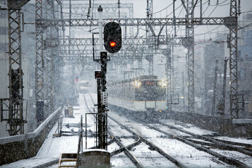 Similar – Frozen clock in snowy train station