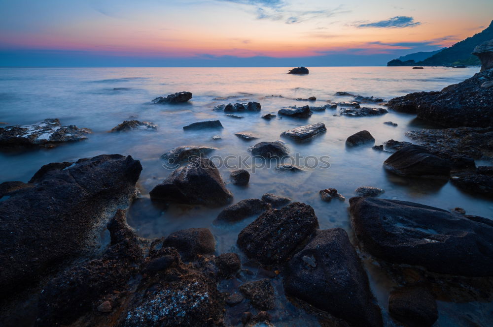 Similar – Rocky coast in the morning light