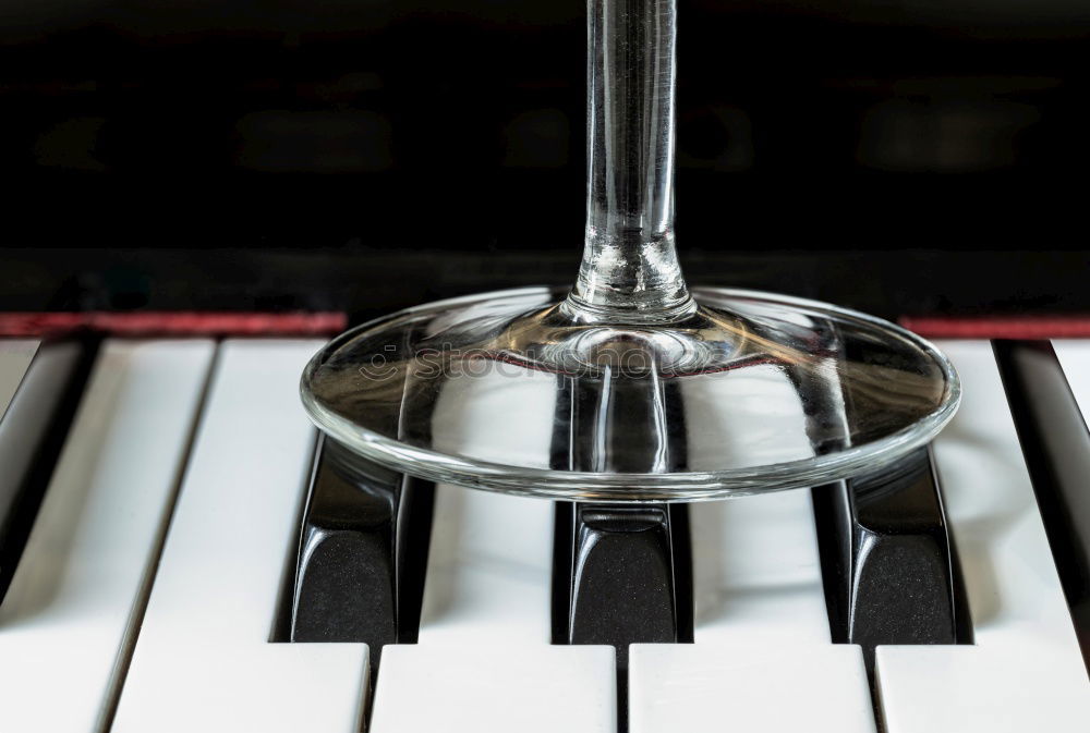 Similar – Image, Stock Photo Concert grand piano on parquet floor with keys and pedals in partial view oblique from above with shallow depth of field