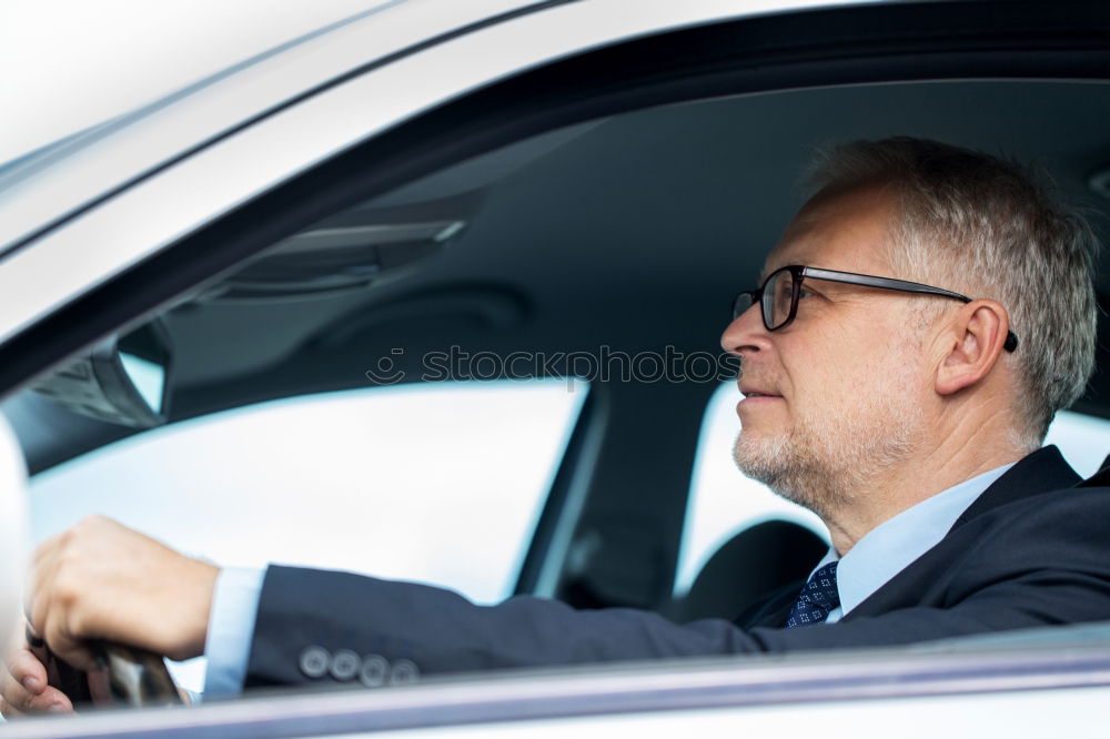 Similar – Image, Stock Photo Young man driving a car