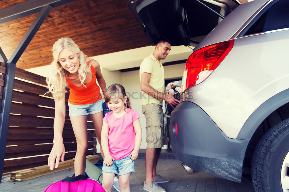 Similar – Happy father and son getting ready for road trip on a sunny day.