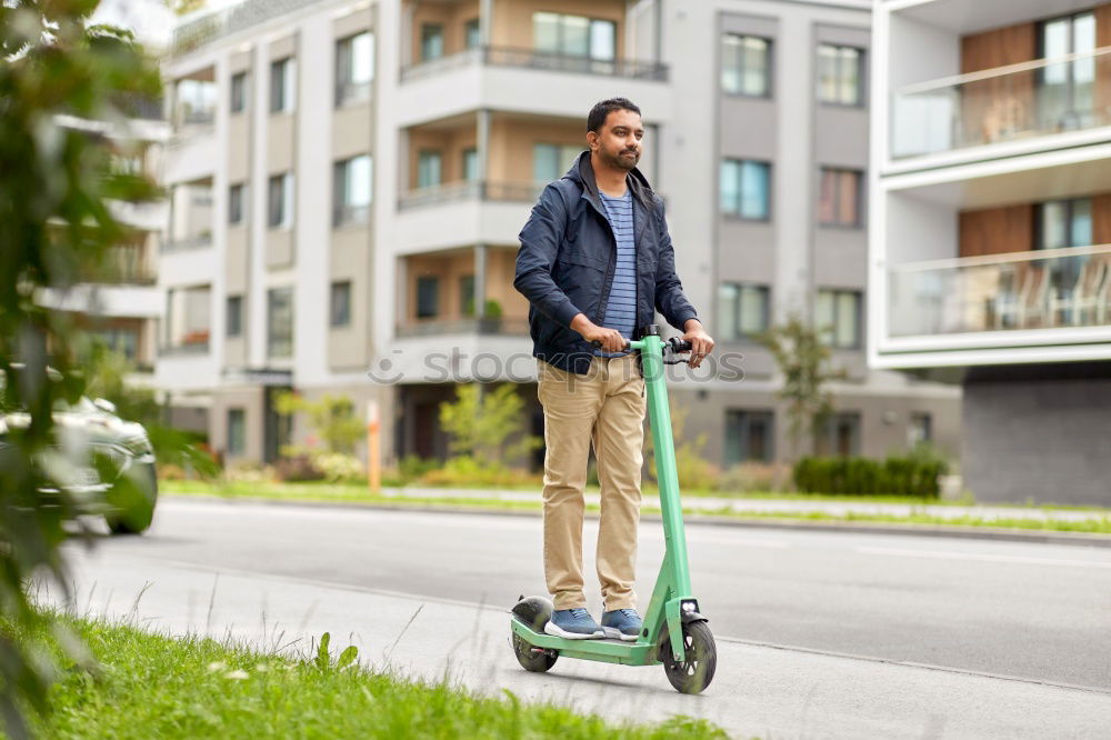 Similar – Foto Bild Frau mittleren Alters auf einem Elektroroller