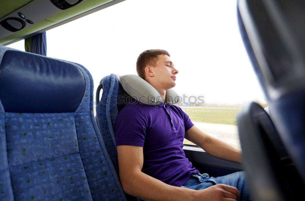 Similar – Man listening music in train