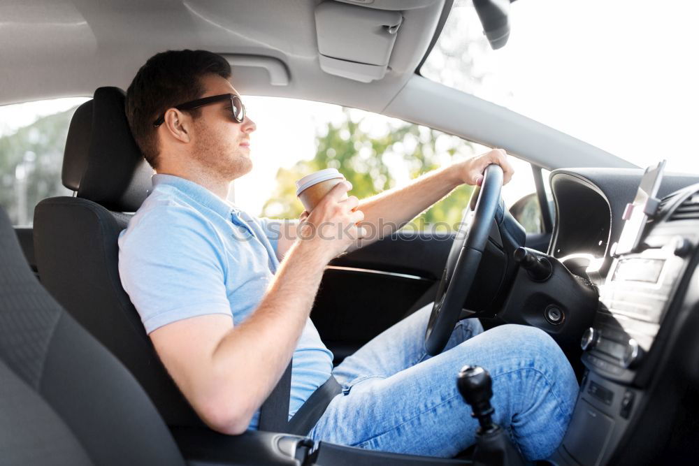 Similar – Image, Stock Photo Young man driving a car