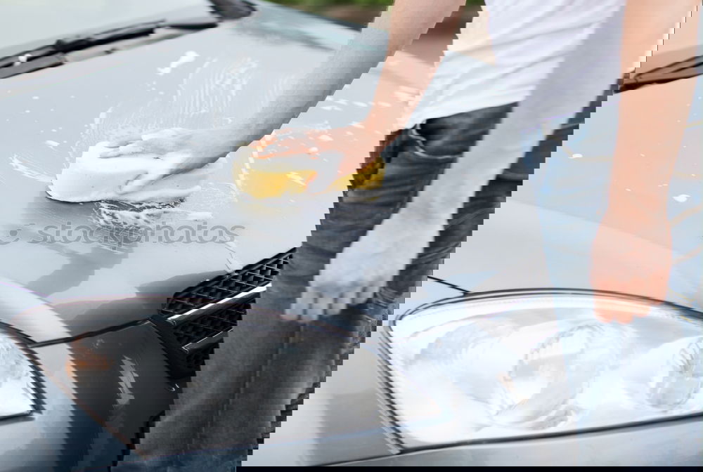 Similar – Image, Stock Photo Man worker washing car with sponge
