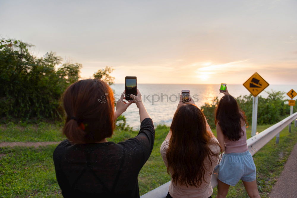 Similar – Image, Stock Photo Group of happy girlfriends having fun skateboarding