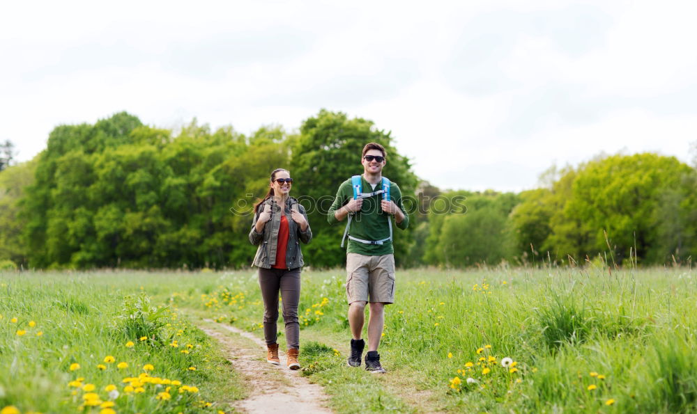 Similar – Couple taking a walk