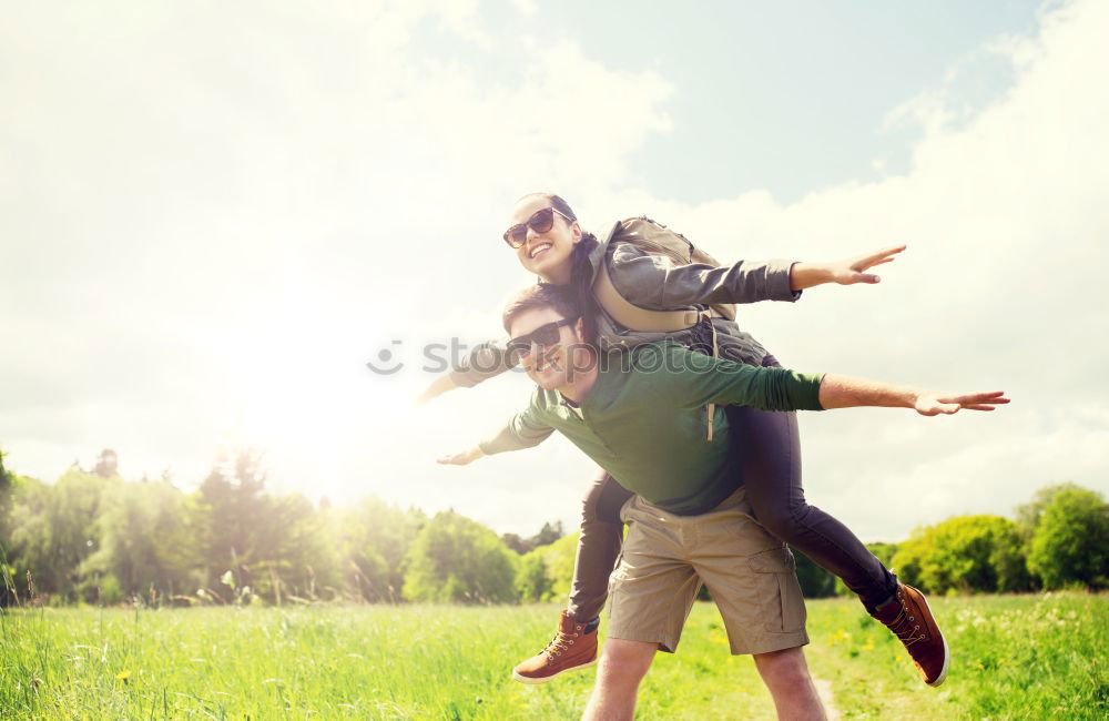 Similar – happy father and daughter walking on summer meadow