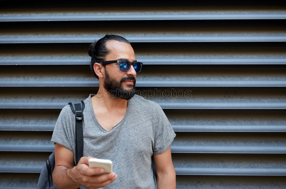 Similar – Confident man wearing stylish sunglasses