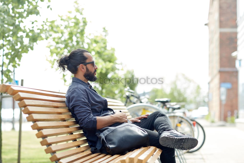 Similar – Image, Stock Photo Young man with mobile phone and fixed gear bicycle.