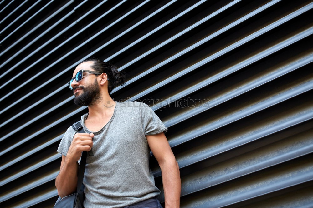 Similar – Confident man wearing stylish sunglasses