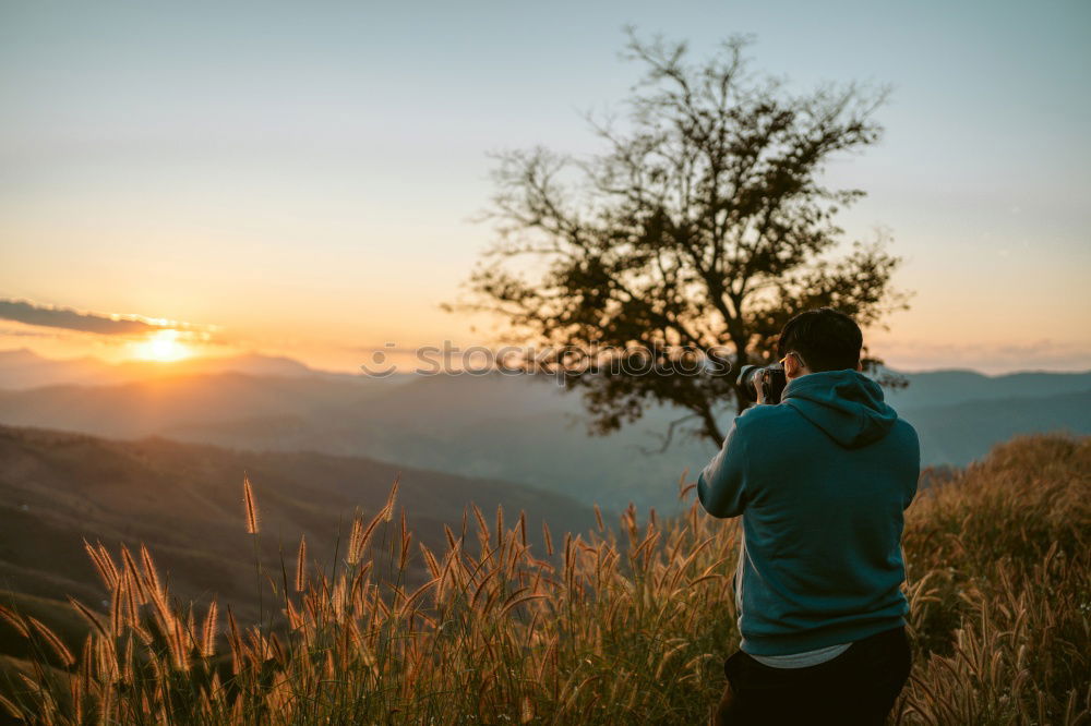 Similar – Image, Stock Photo Man in forest looking into backpack