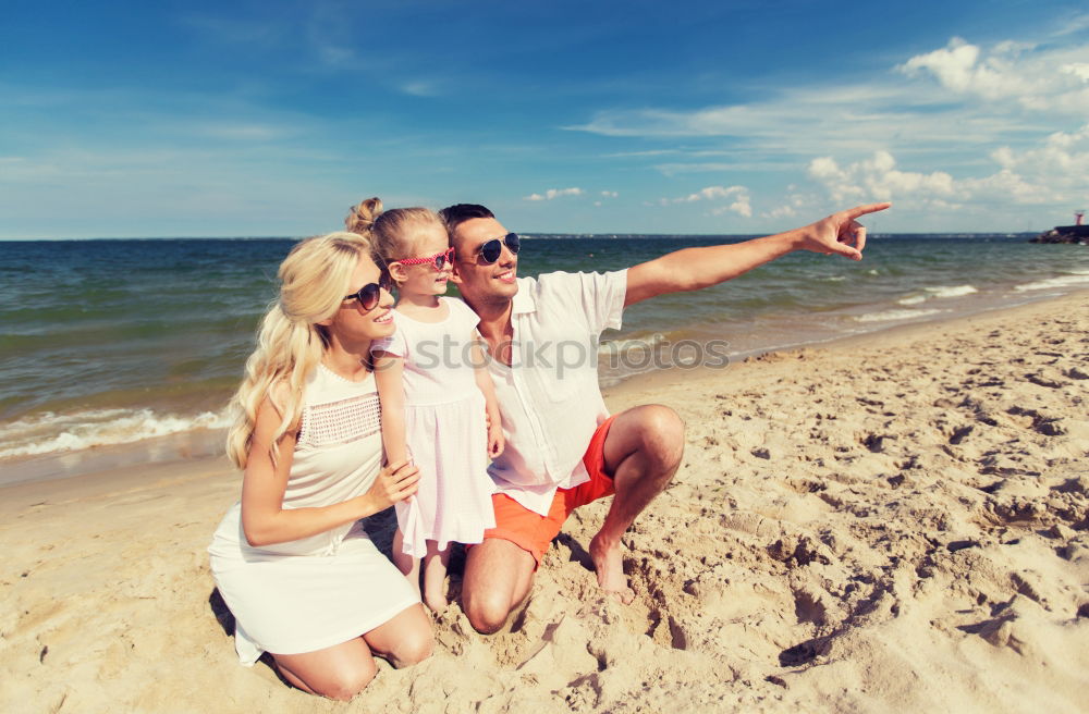 Similar – Father and son playing on the beach at the day time. They are dressed in sailor’s vests and pirate costumes. Concept of happy game on vacation and friendly family.