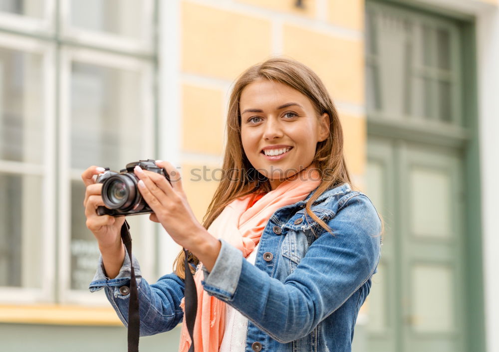 Similar – Image, Stock Photo Young woman using a camera to take photo.