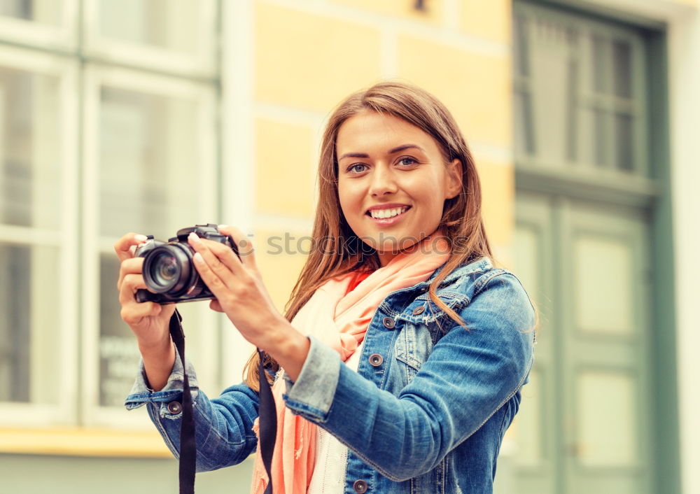 Similar – Image, Stock Photo Young woman using a camera to take photo.