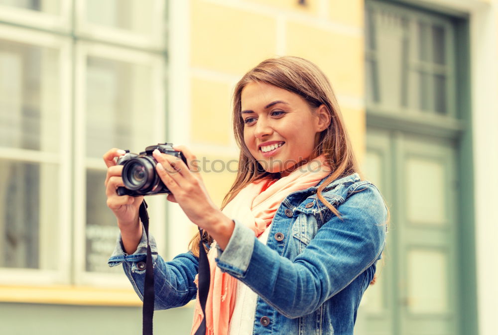 Similar – Image, Stock Photo Young woman using a camera to take photo.