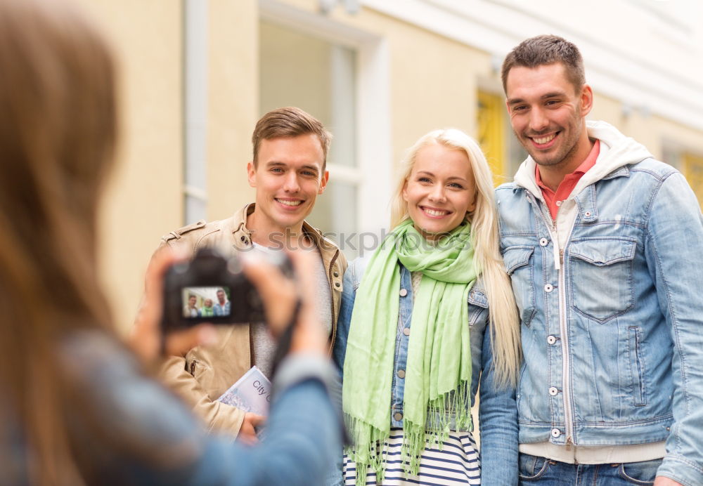 Similar – Multiracial group of three friends having a coffee together