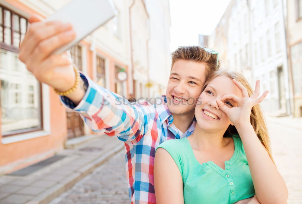 Similar – young couple taking a selfie