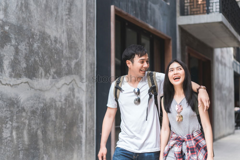 Similar – Young beautiful couple posing wearing jeans and t-shirt