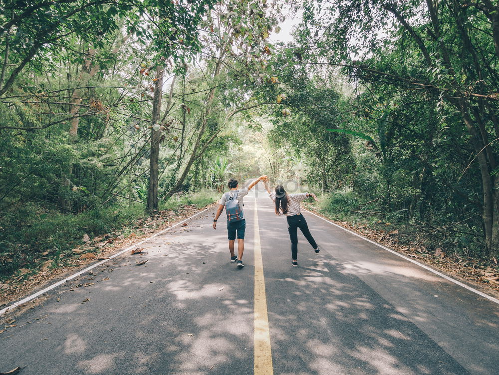 Similar – Image, Stock Photo Group of happy girlfriends having fun skateboarding