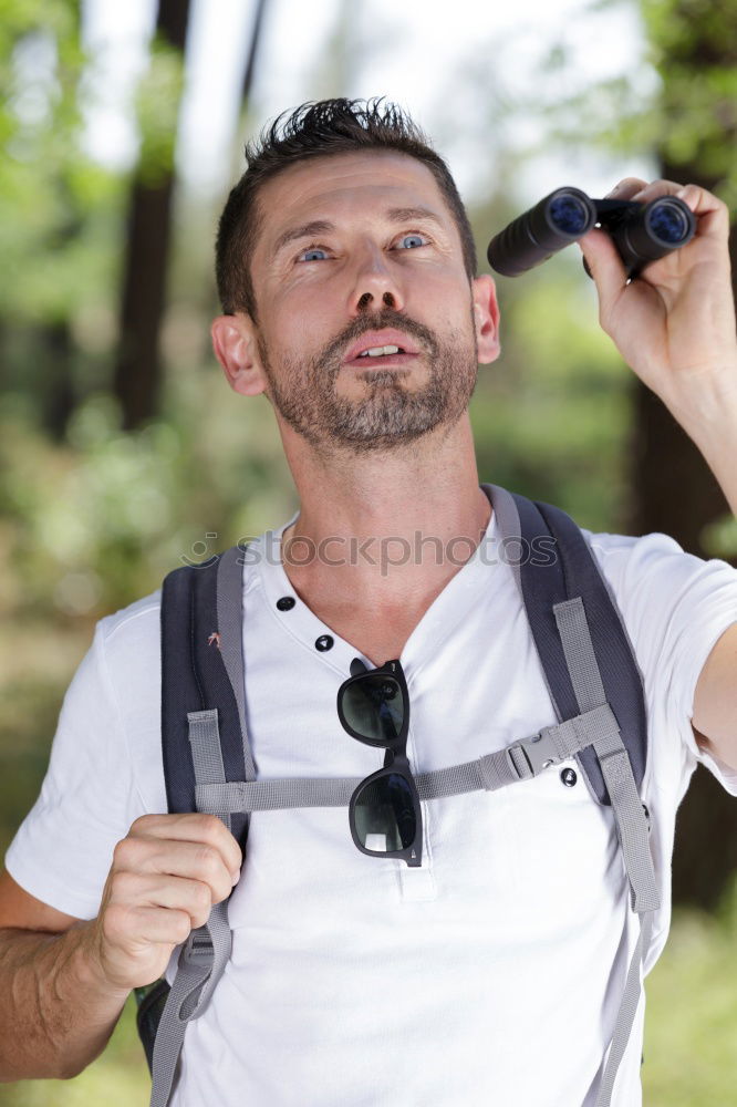 Similar – Image, Stock Photo Young bearded man drinking bottled water